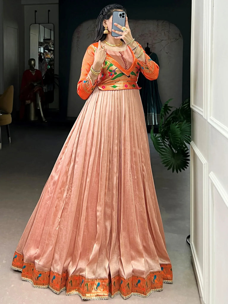 Captivating Peach Zari Weaving Silk Function Wear Gown