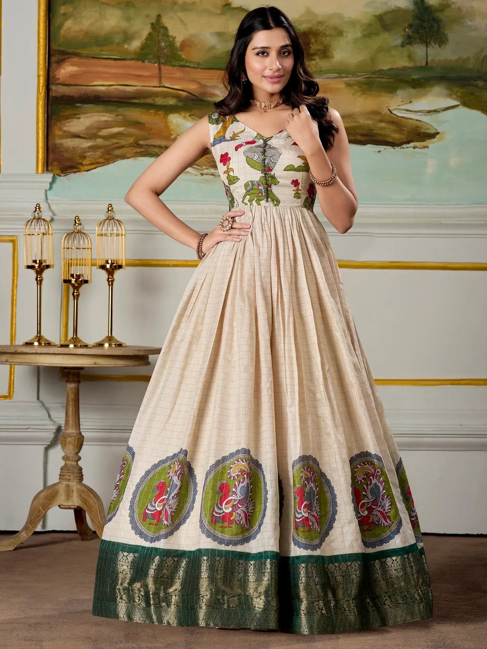 Beige ethnic gown with elephant & peacock print, green border, perfect for Indian occasions