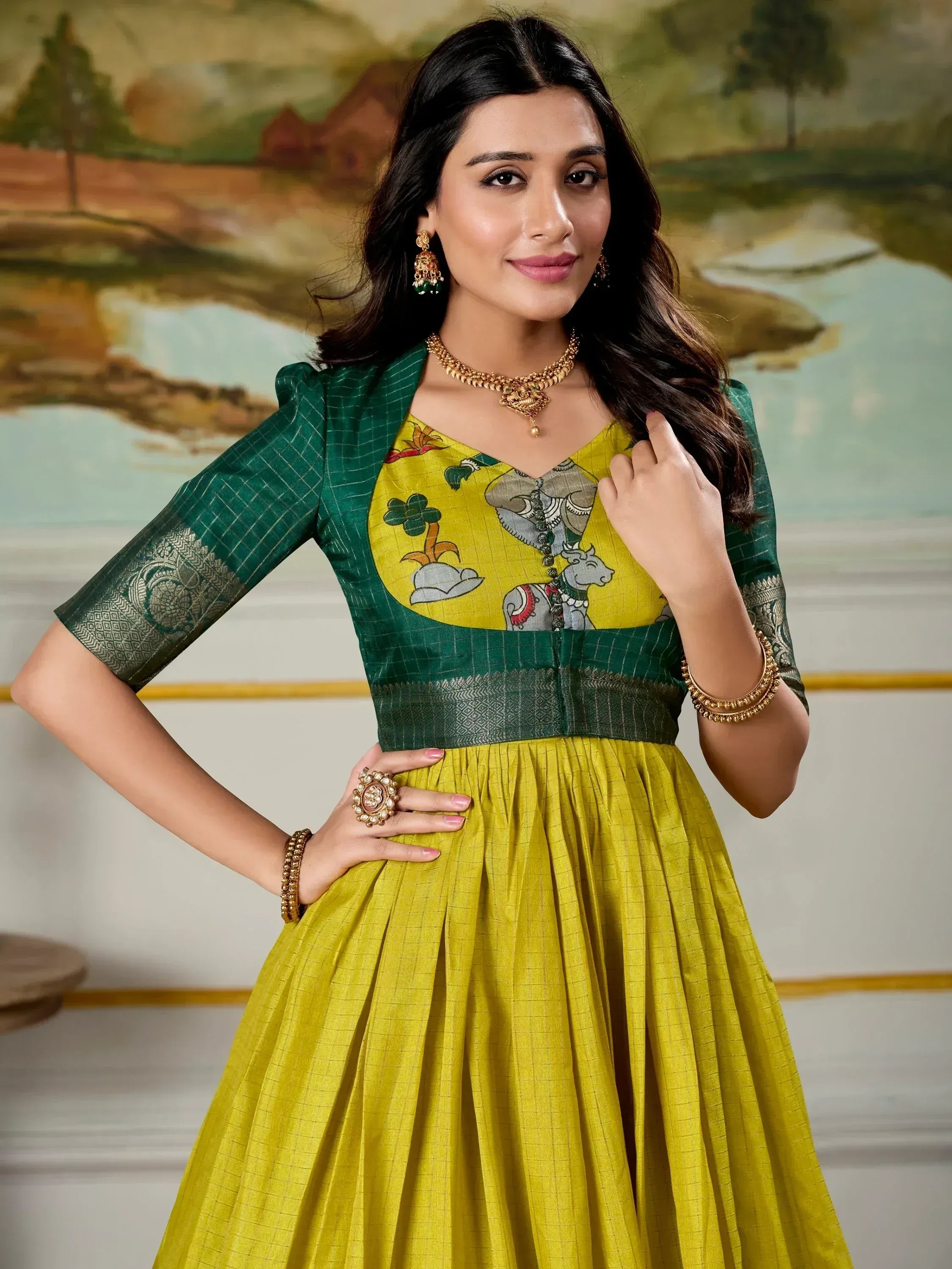 Yellow and green ethnic gown with elephant print, perfect for Indian festive occasions and weddings
