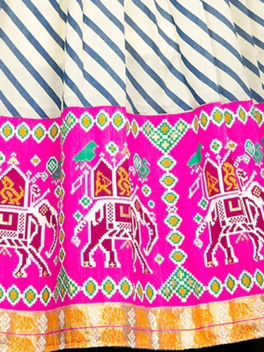 Vibrant pink and blue striped ethnic skirt with elephant print and geometric border, ideal for Indian wear
