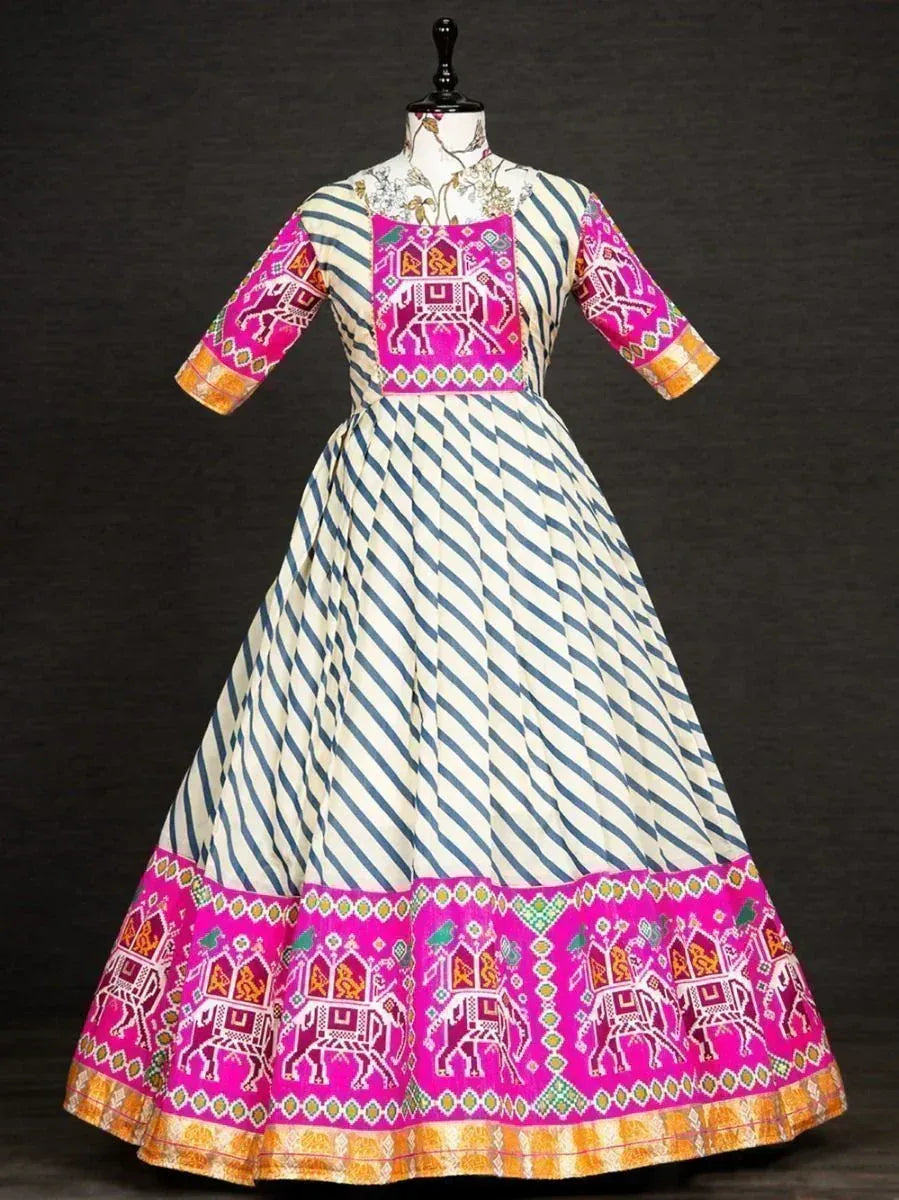 Indian ethnic anarkali gown with blue-white stripes and pink elephant embroidery, perfect for festive occasions.
