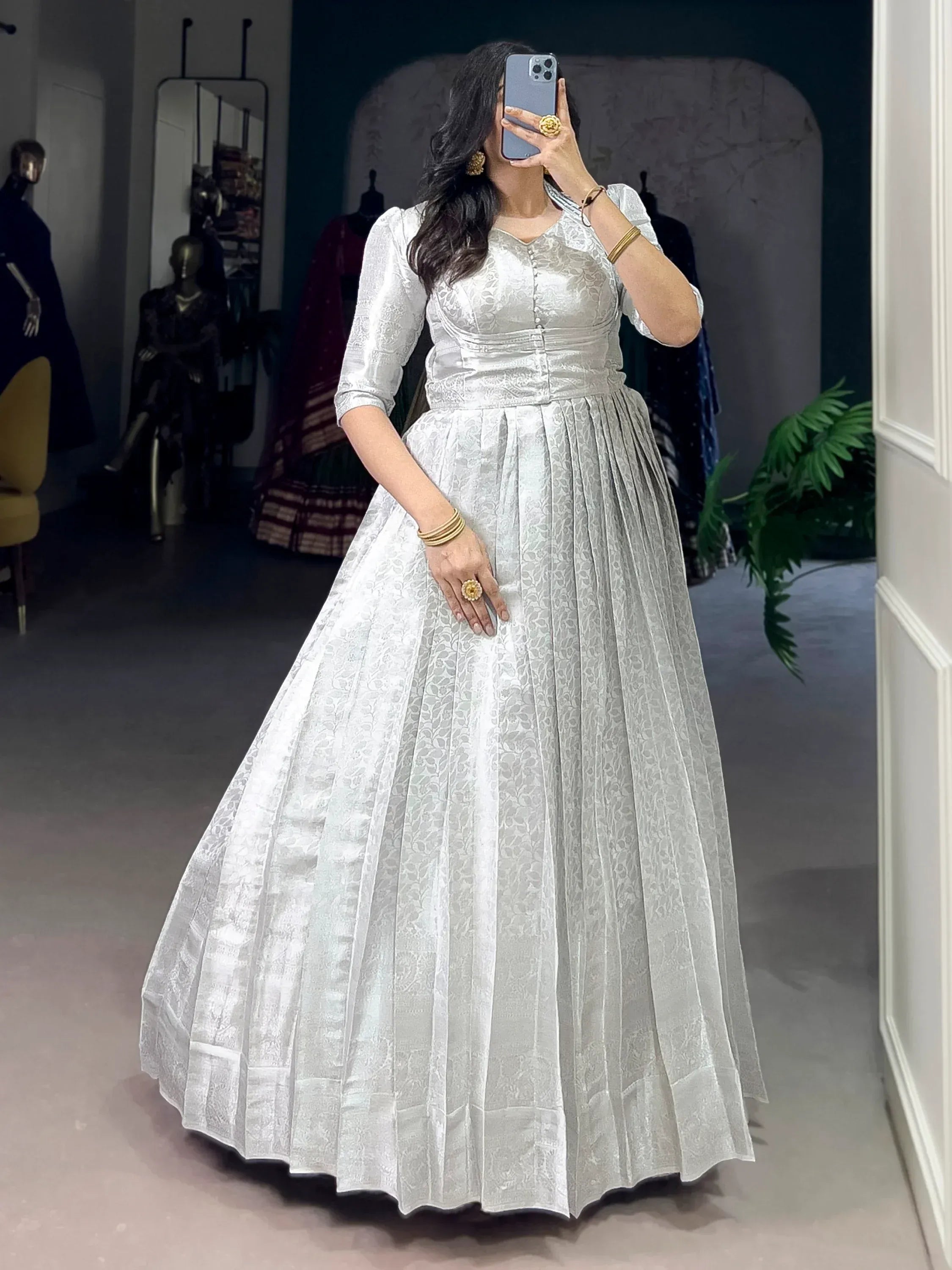 Awesome Off-White Zari Weaving Silk Festive Wear Gown With Koti