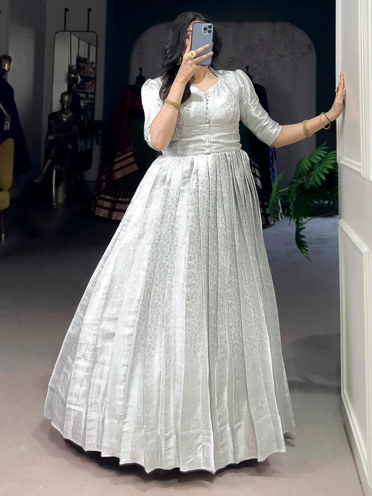 Awesome Off-White Zari Weaving Silk Festive Wear Gown With Koti