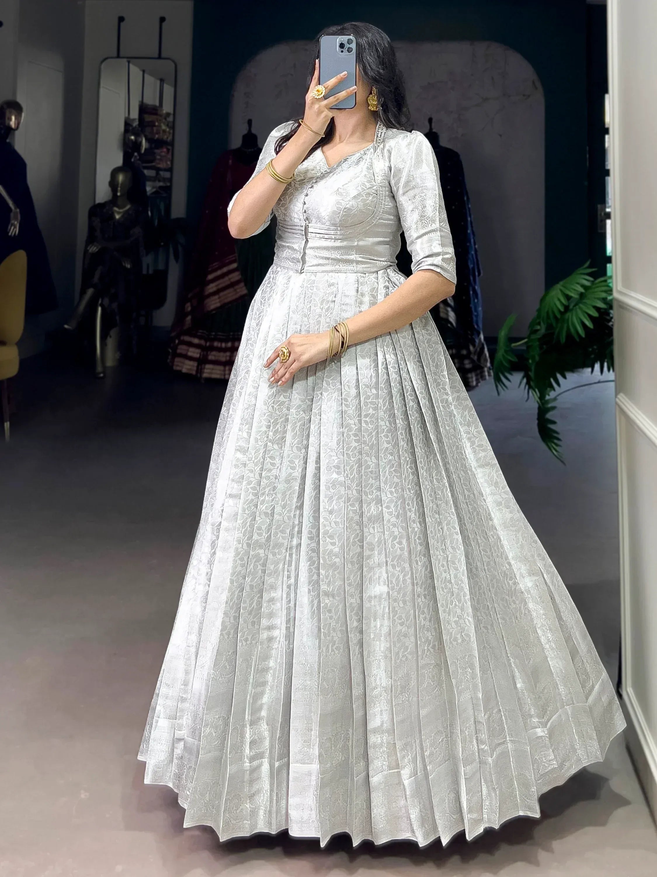 Awesome Off-White Zari Weaving Silk Festive Wear Gown With Koti