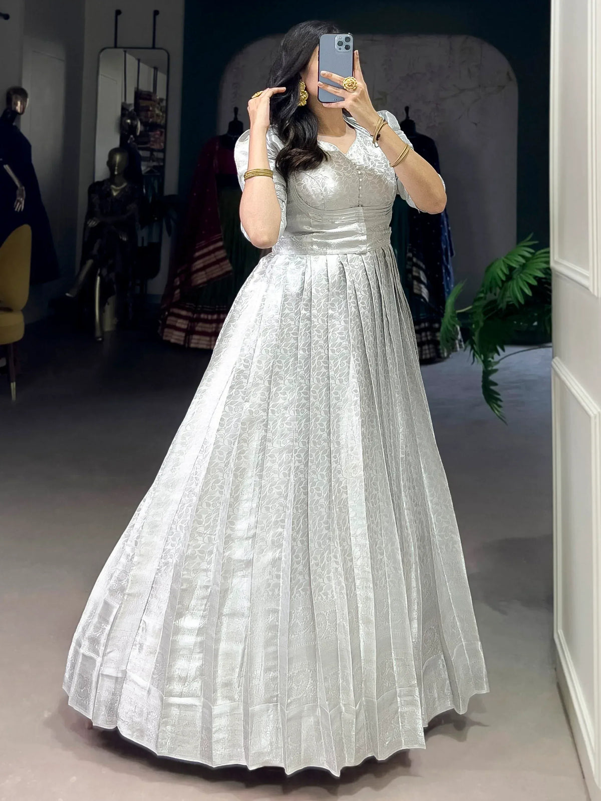 Awesome Off-White Zari Weaving Silk Festive Wear Gown With Koti