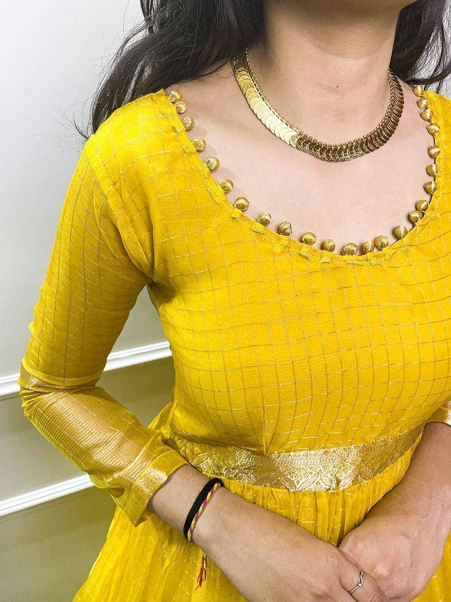 Yellow Indian ethnic gown with gold detailing and round neckline, festive ethnic wear