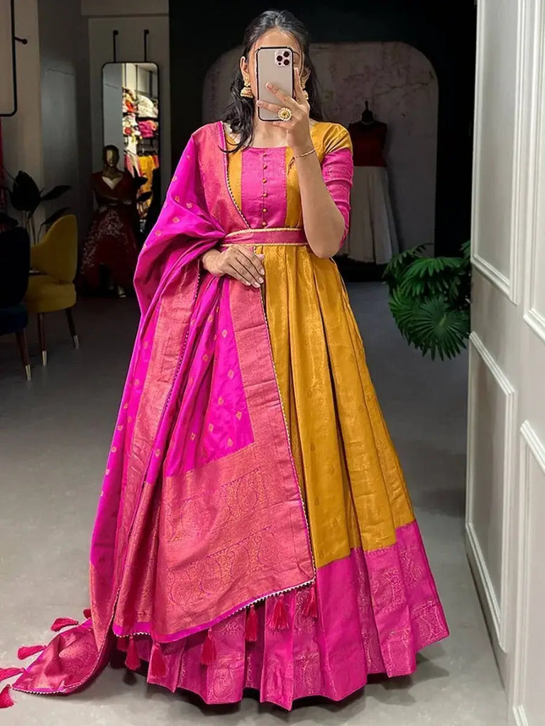 Prodigious Mustard Yellow Zari Weaving Silk Haldi Wear Gown With Belt