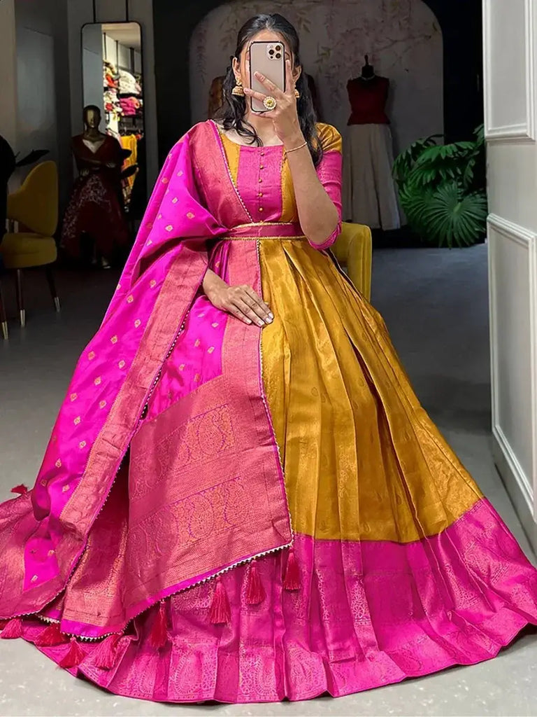 Prodigious Mustard Yellow Zari Weaving Silk Haldi Wear Gown With Belt