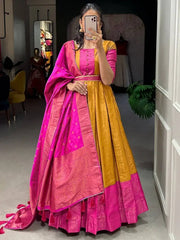 Prodigious Mustard Yellow Zari Weaving Silk Haldi Wear Gown With Belt