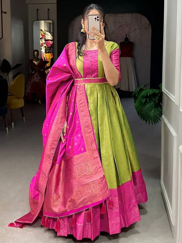 Glamorous Green Zari Weaving Silk Reception Wear Gown With Belt