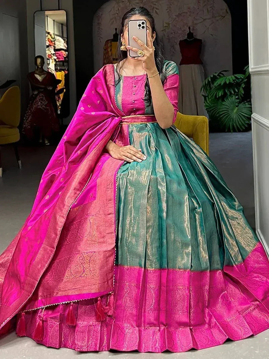 Pink and teal designer lehenga choli with gold zari work, perfect for Indian ethnic occasions