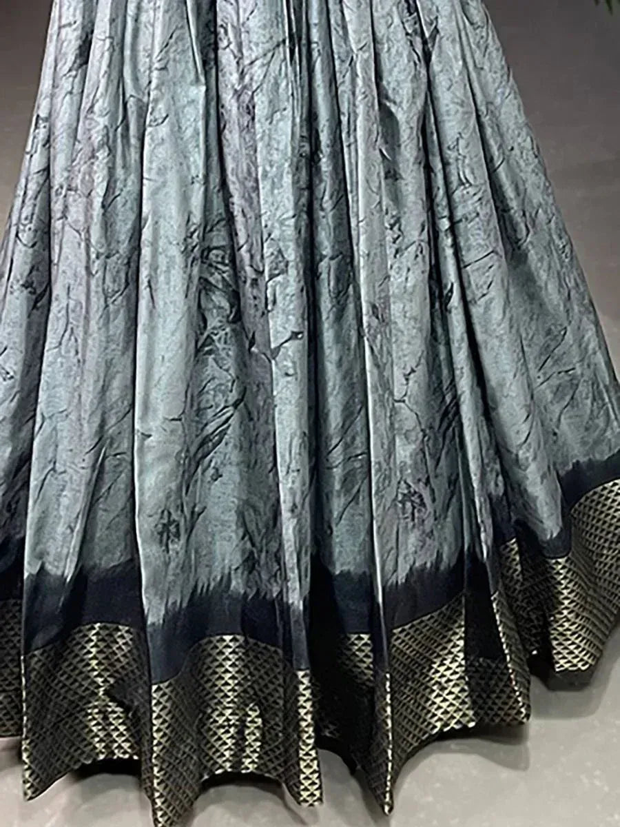 Grey printed lehenga skirt with black and gold geometric border, ethnic wear for women