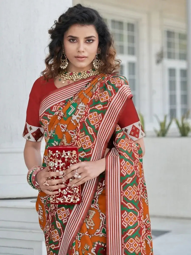 Phenomenal Dusty Orange Patola Weaving Silk Festive Wear Saree