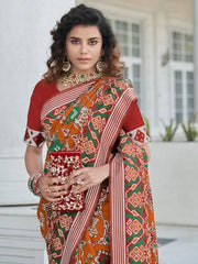 Phenomenal Dusty Orange Patola Weaving Silk Festive Wear Saree