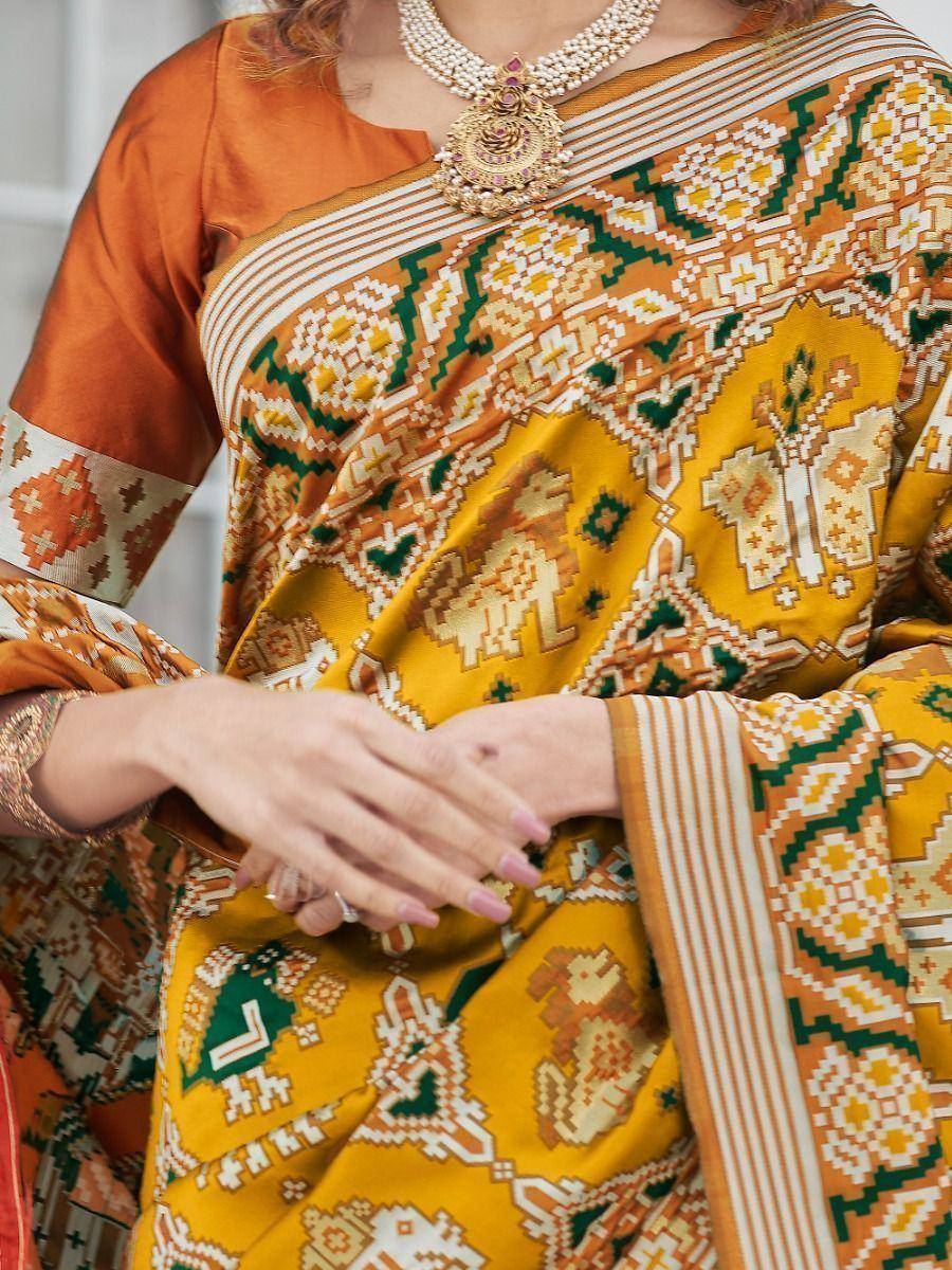 Yellow and green printed saree with orange blouse, traditional Indian ethnic wear