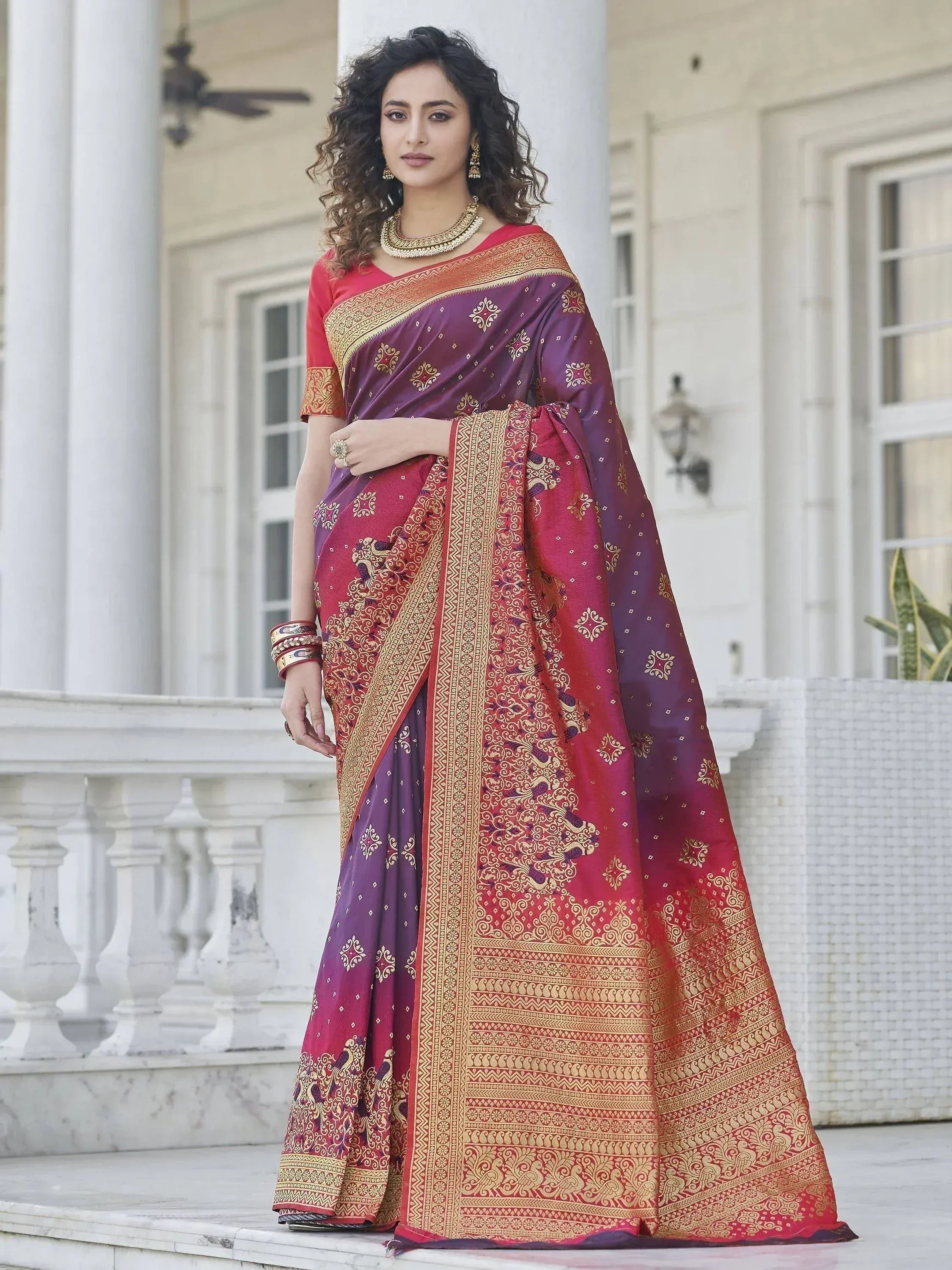 Elegant purple and red ethnic saree with gold embroidery, perfect for Indian occasions and festivals.