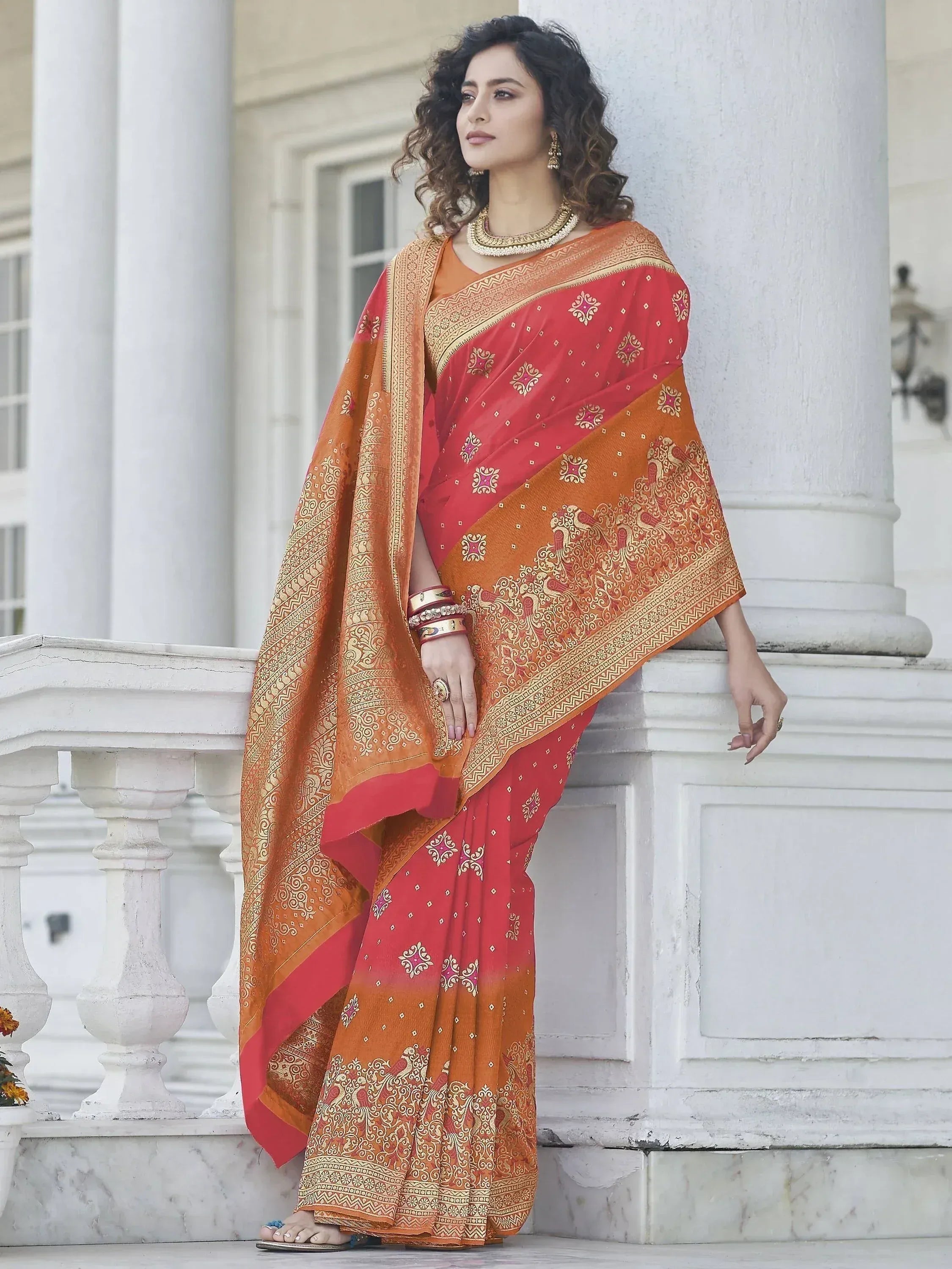 Red and orange designer saree with gold embroidery, perfect for Indian ethnic wear occasions