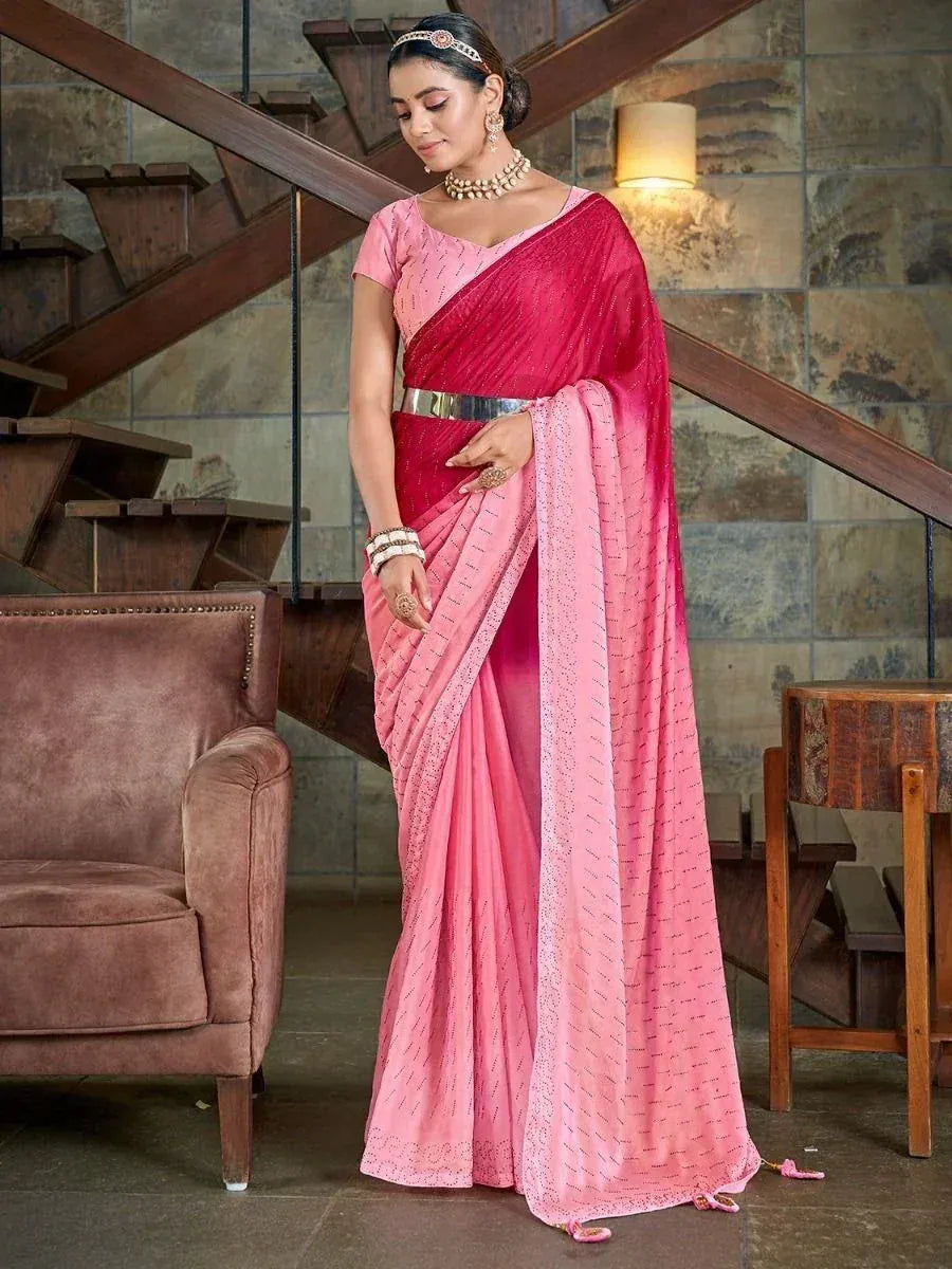 Pink ombre saree with sequin detailing, styled with silver belt and traditional jewelry for ethnic wear