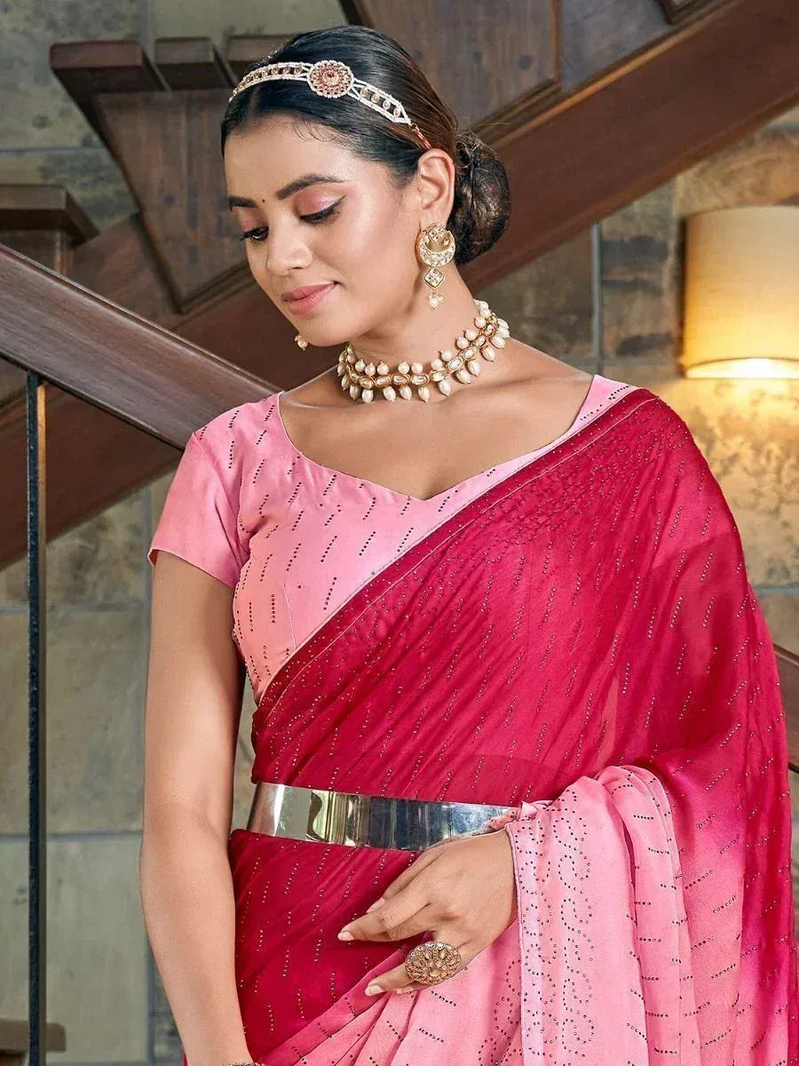 Pink and red designer saree with embellished blouse, perfect for ethnic occasions