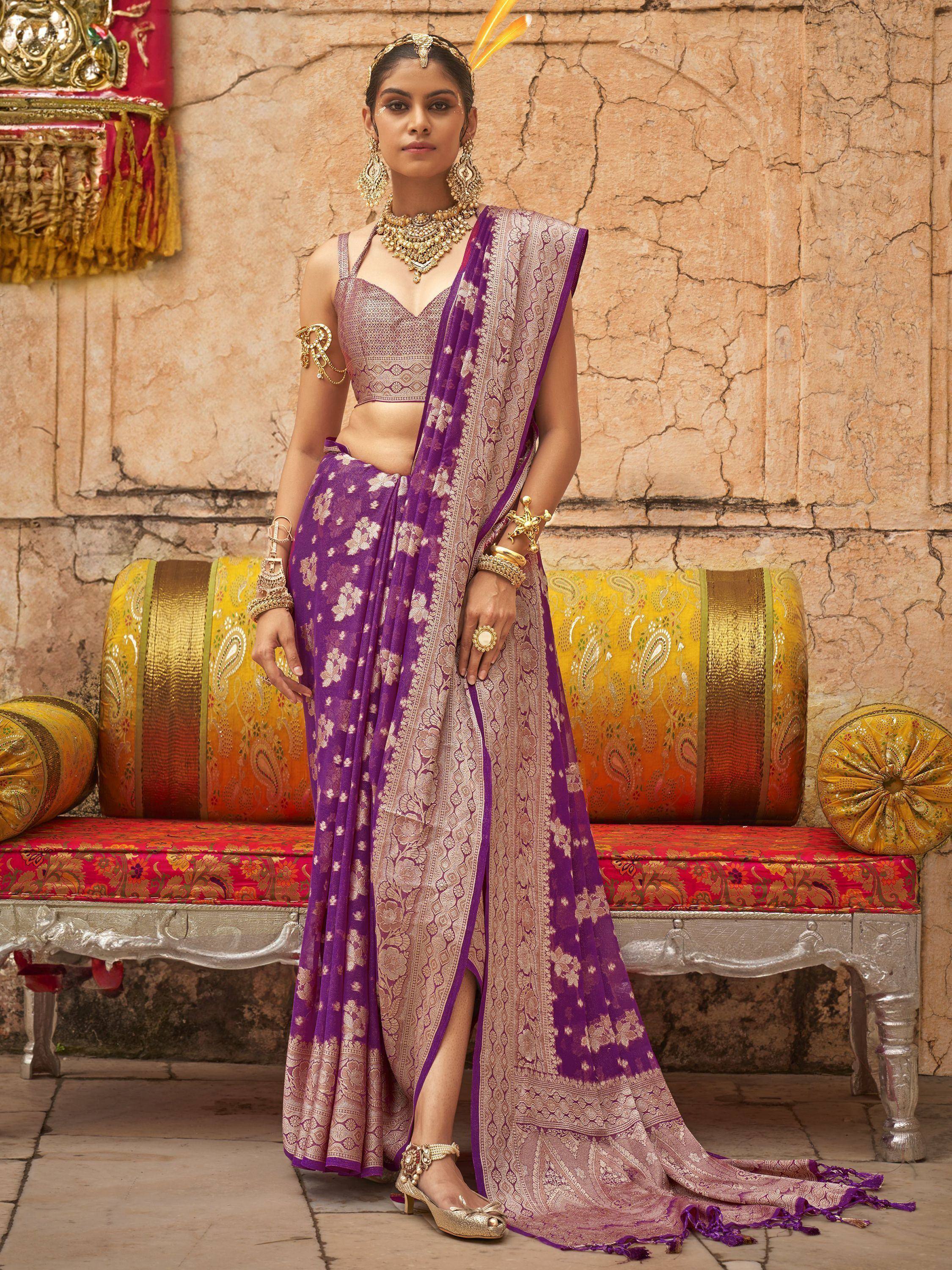 Purple and gold embroidered lehenga choli with matching dupatta, traditional Indian ethnic wear for weddings