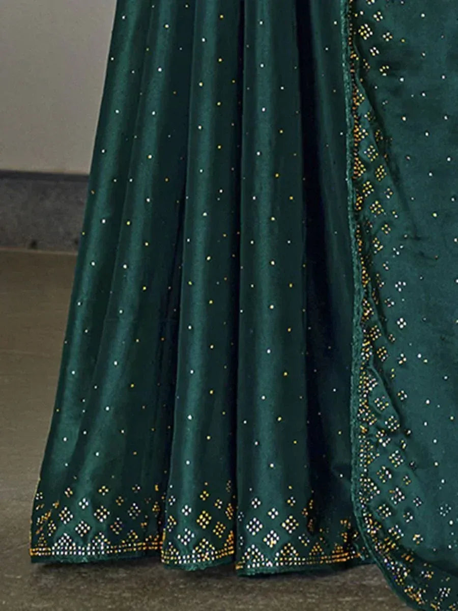 Emerald green lehenga with gold and silver dot embroidery, perfect for Indian ethnic wear occasions.
