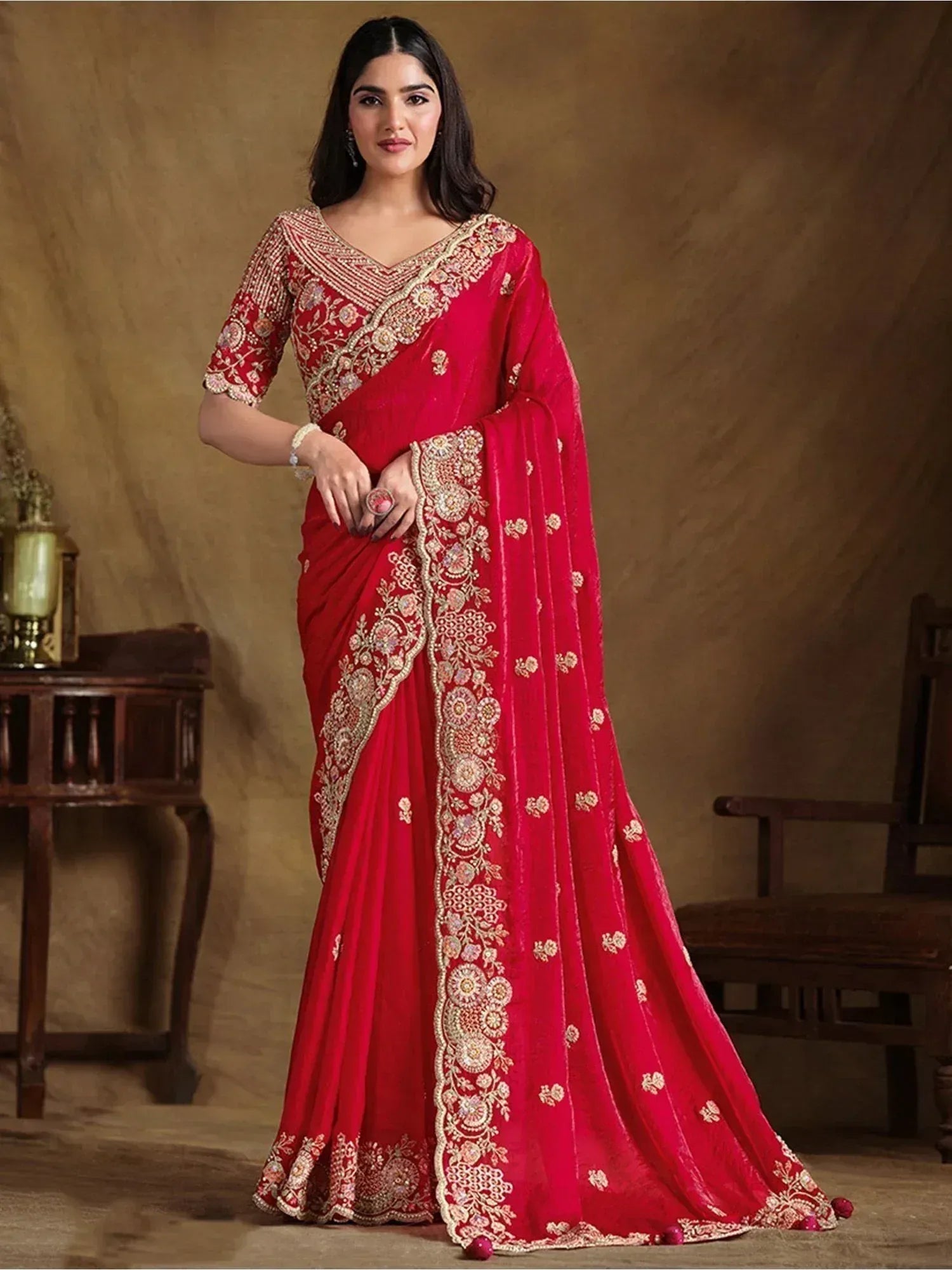 Red embroidered saree with gold floral work, perfect for Indian ethnic occasions and weddings