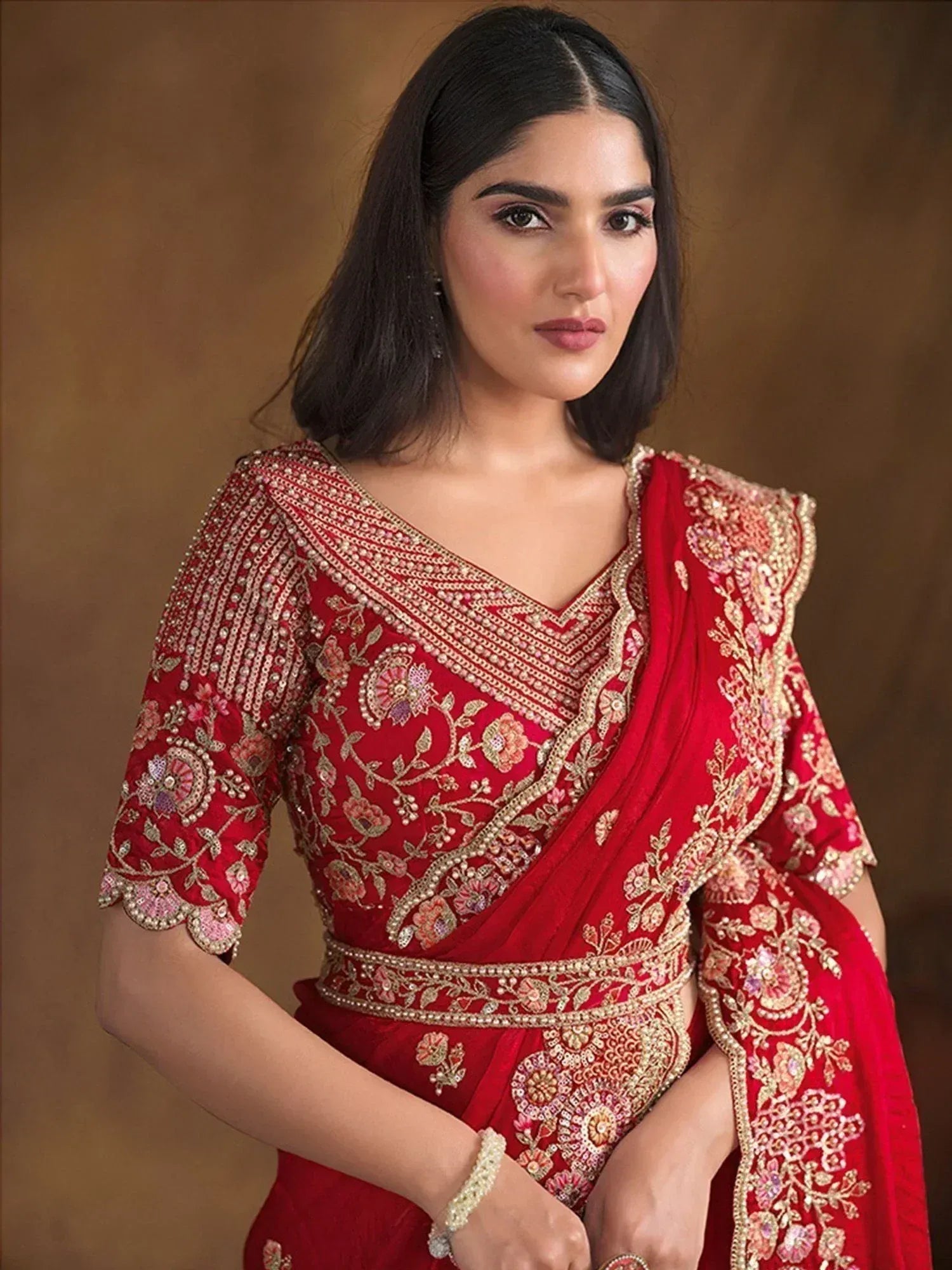 Red embroidered designer saree with gold floral work, perfect for Indian ethnic wear occasions