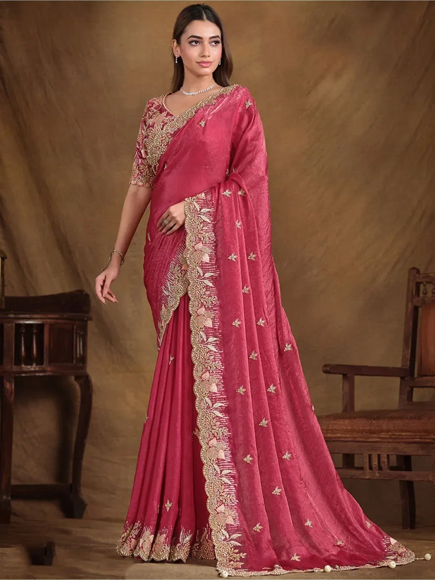 Pink designer saree with gold embroidery, perfect for Indian ethnic wear and festive occasions