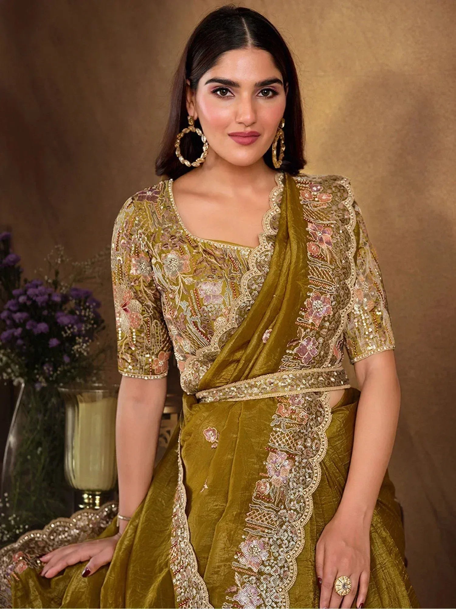 Olive green embroidered saree with floral sequin work, perfect for Indian ethnic occasions and festive wear.