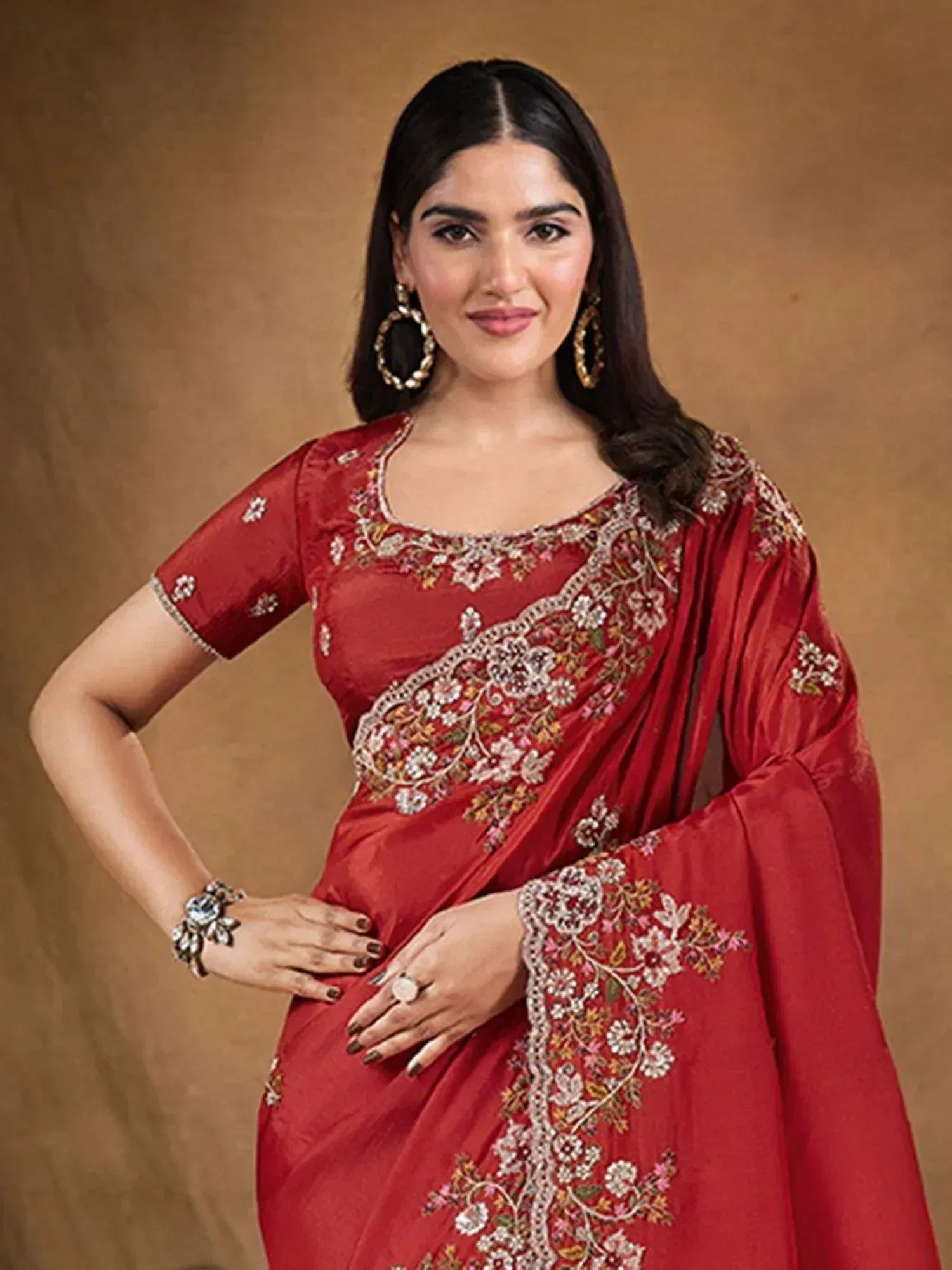 Red embroidered saree with floral design, perfect for Indian ethnic wear occasions