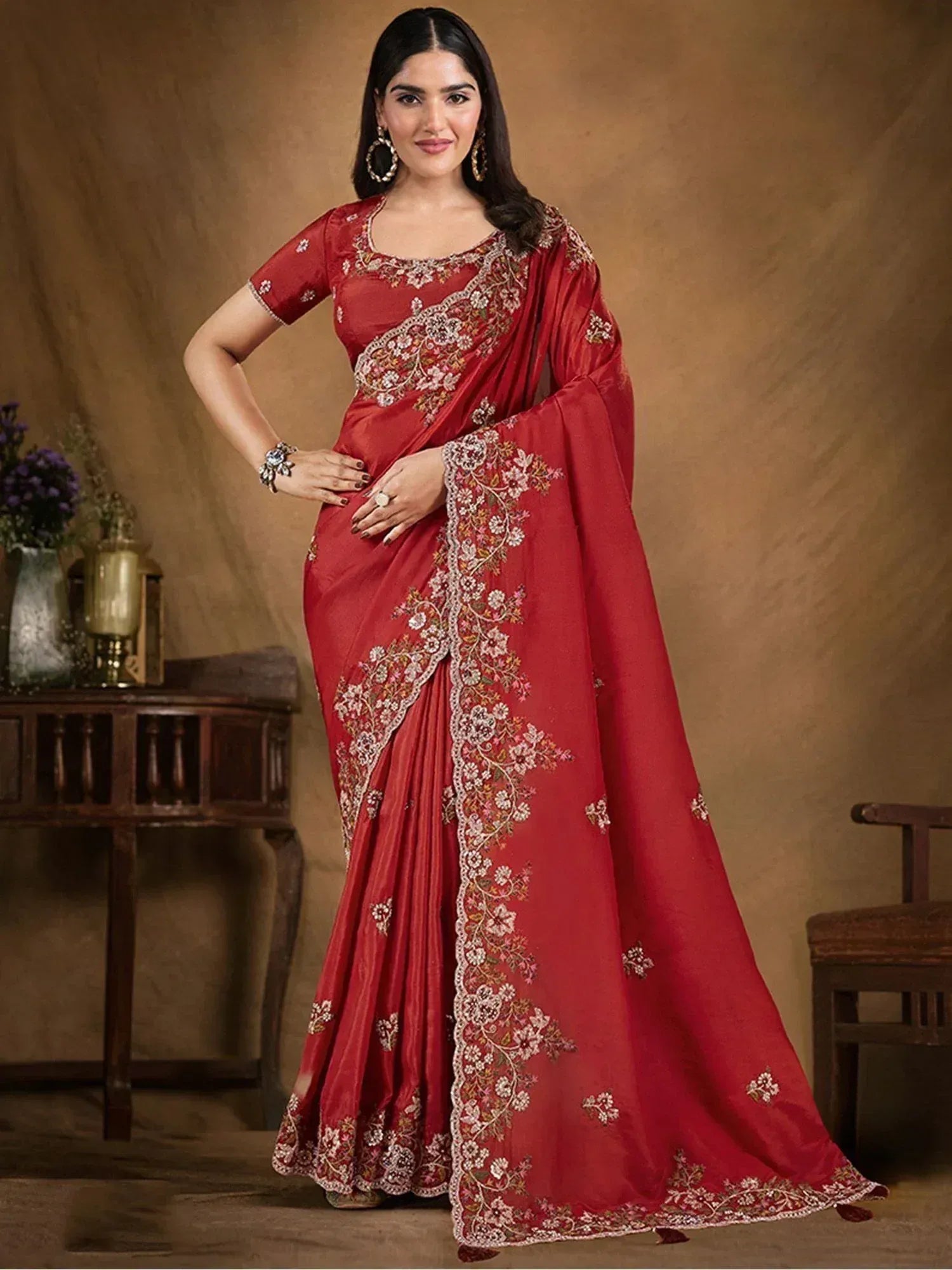 Red embroidered saree with floral design, perfect for Indian ethnic wear occasions