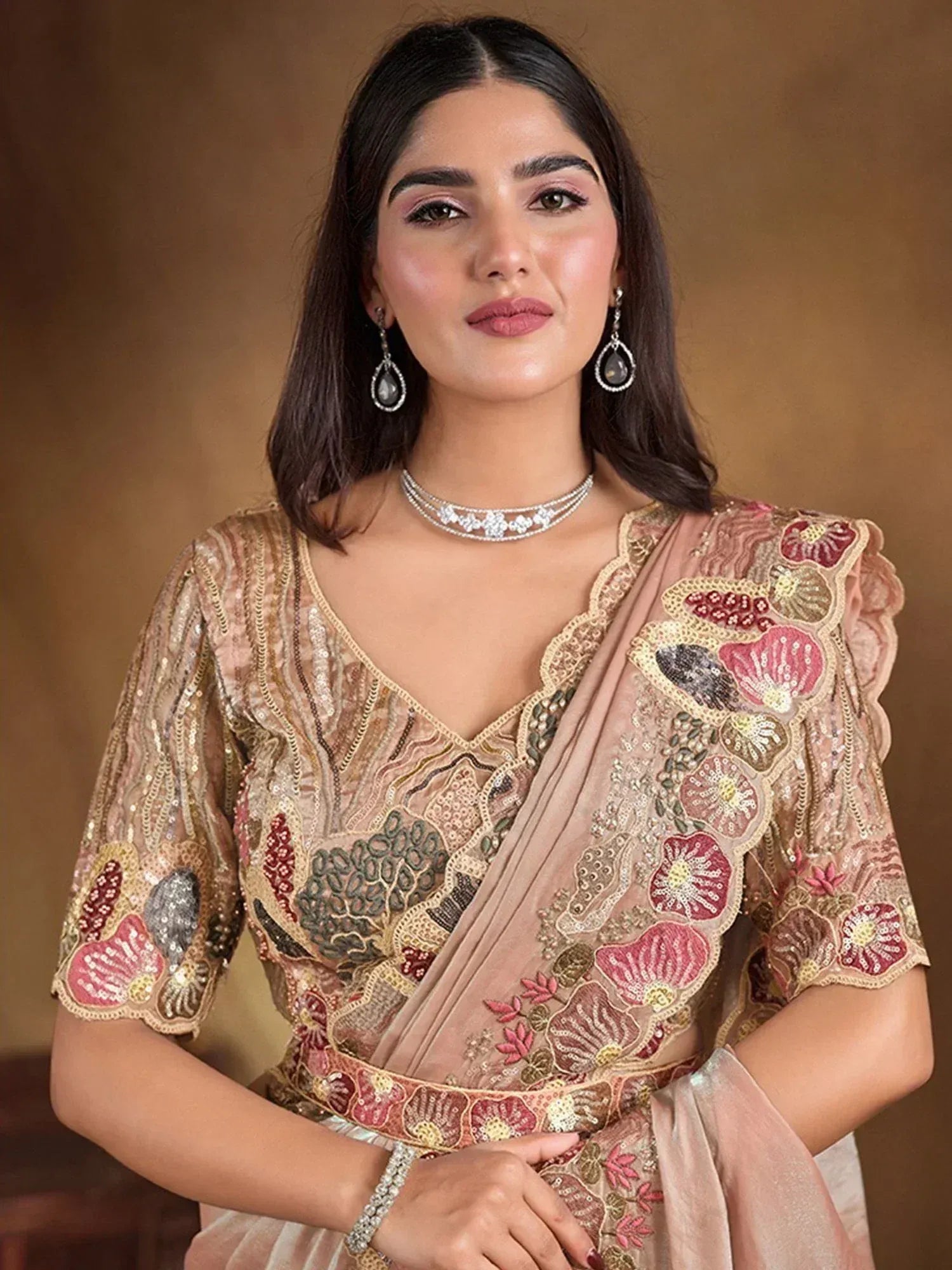 Elegant Indian ethnic saree with floral embroidery and sequin detailing, perfect for festive occasions