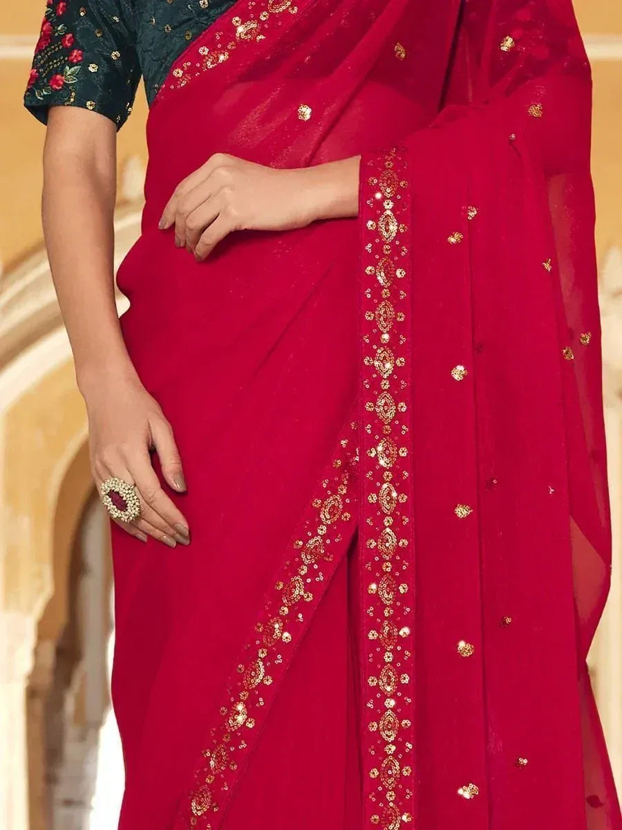 Red ethnic saree with gold embroidery and floral blouse, perfect for Indian occasions