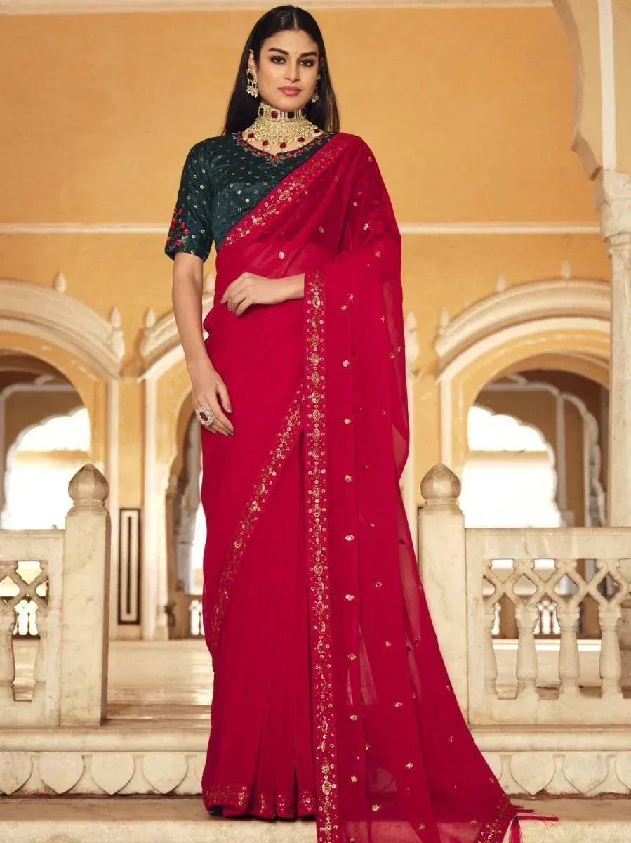 Red embroidered saree with green blouse, traditional Indian ethnic wear for festive occasions