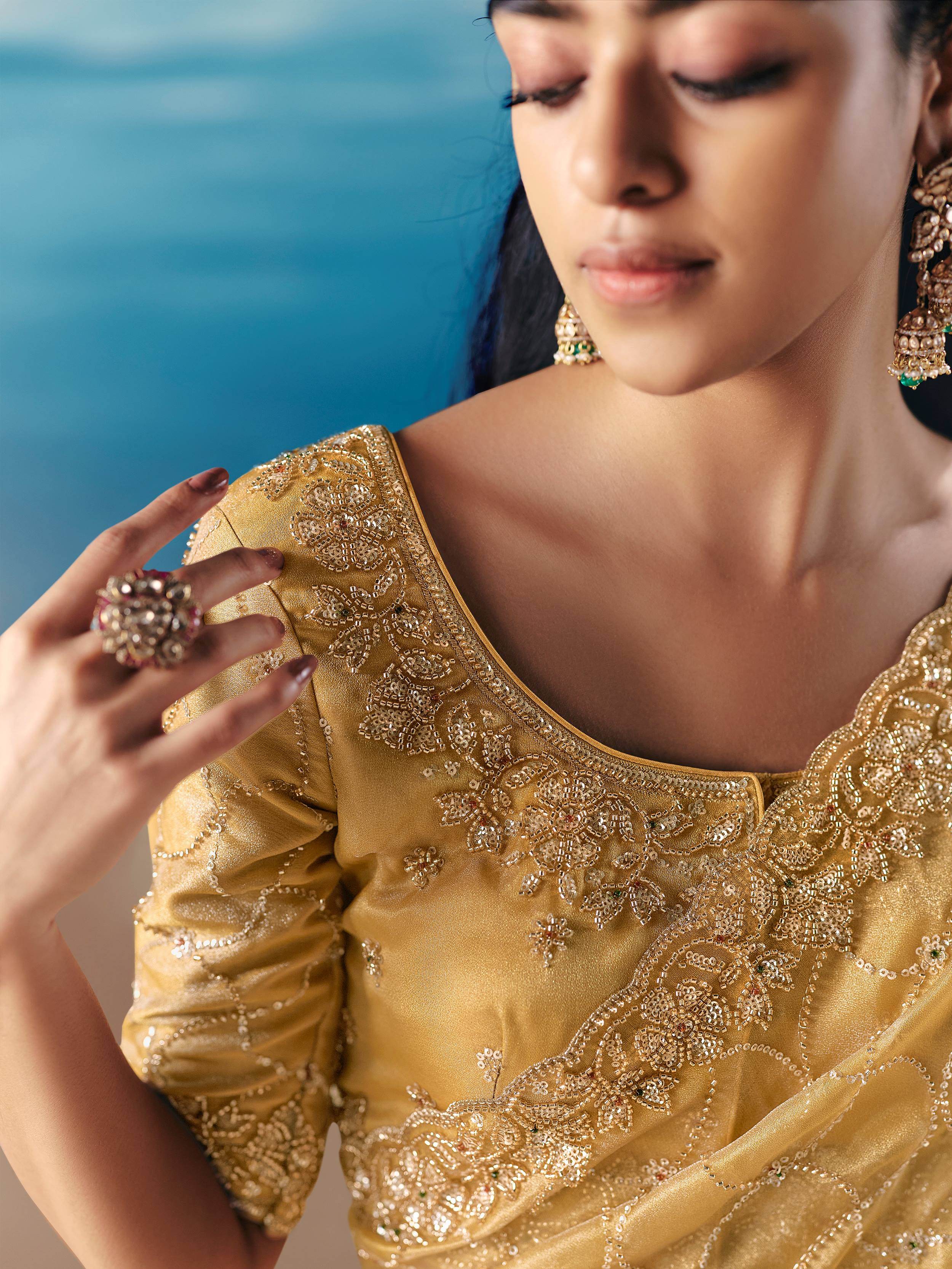 Adorable Golden Sequins Georgette Party Wear Saree With Blouse