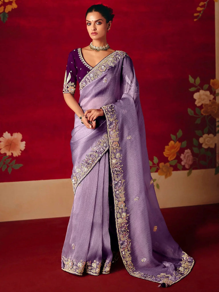 Glamorous Purple Embroidered Organza Wedding Wear Saree With Blouse