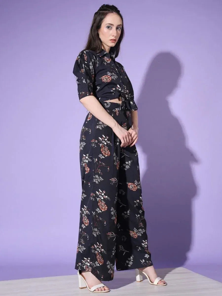 Black floral print ethnic palazzo set with crop top, perfect for modern Indian wear