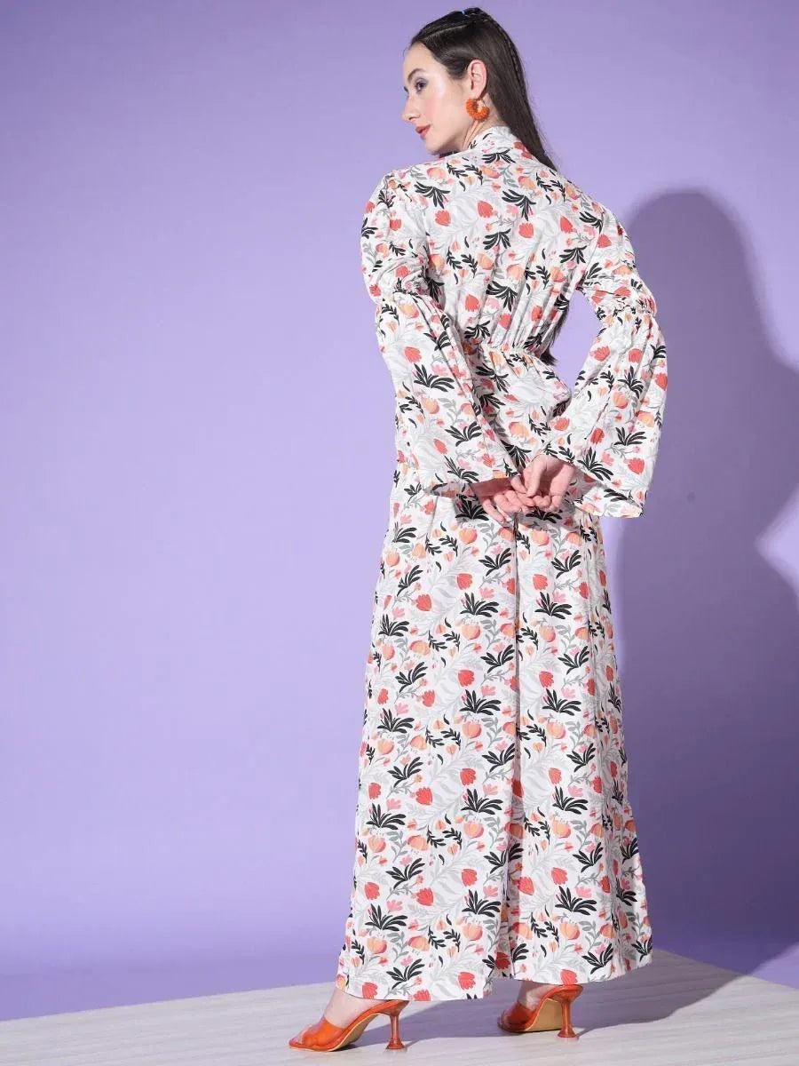 Floral print ethnic gown with bell sleeves, perfect for Indian occasions and festive wear.