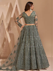 Marvelous Light Green Heavy Embroidered Net Party Wear Lehenga Choli