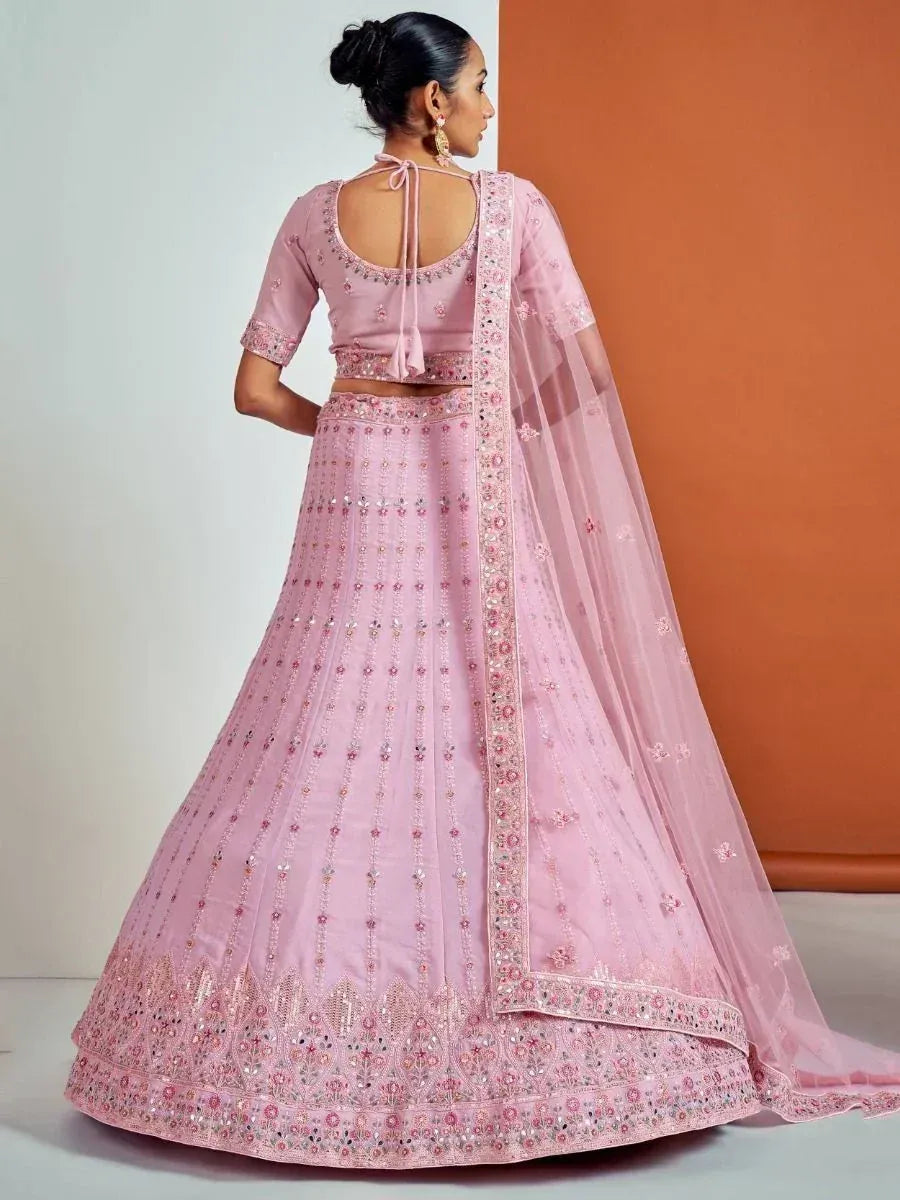 Pink embroidered lehenga choli with back tie blouse and sheer dupatta, ethnic Indian wear