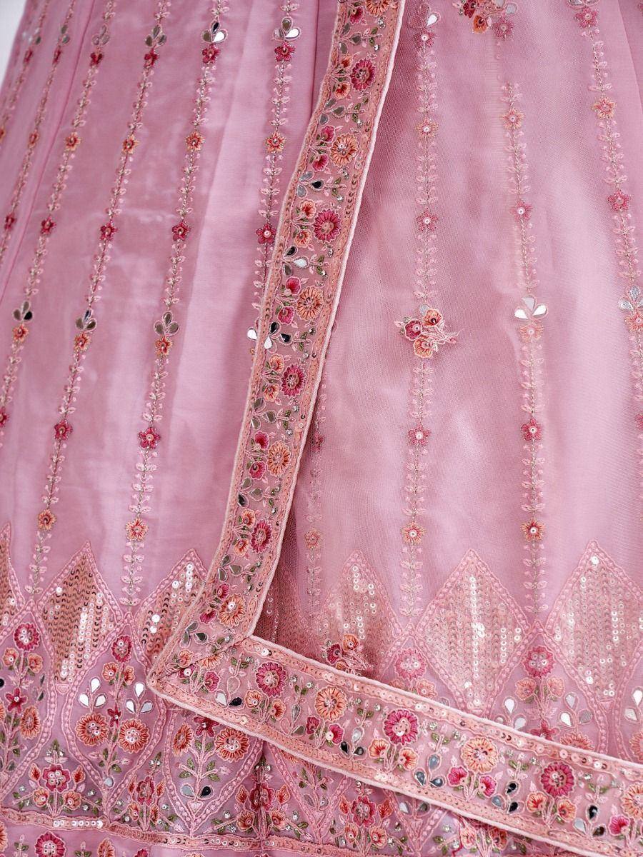 Pink embroidered lehenga choli with floral motifs and sequin detailing, ideal for Indian ethnic wear