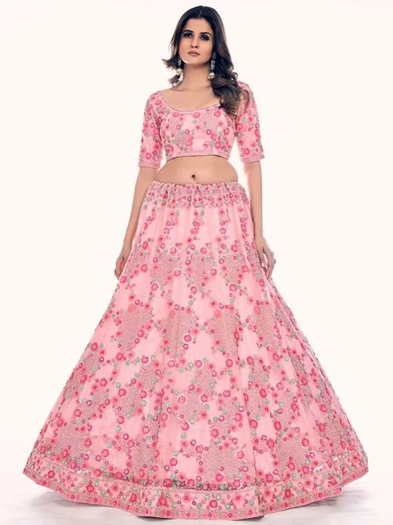 Impressive Pink Embroidered Soft Net Engagement Lehenga Choli