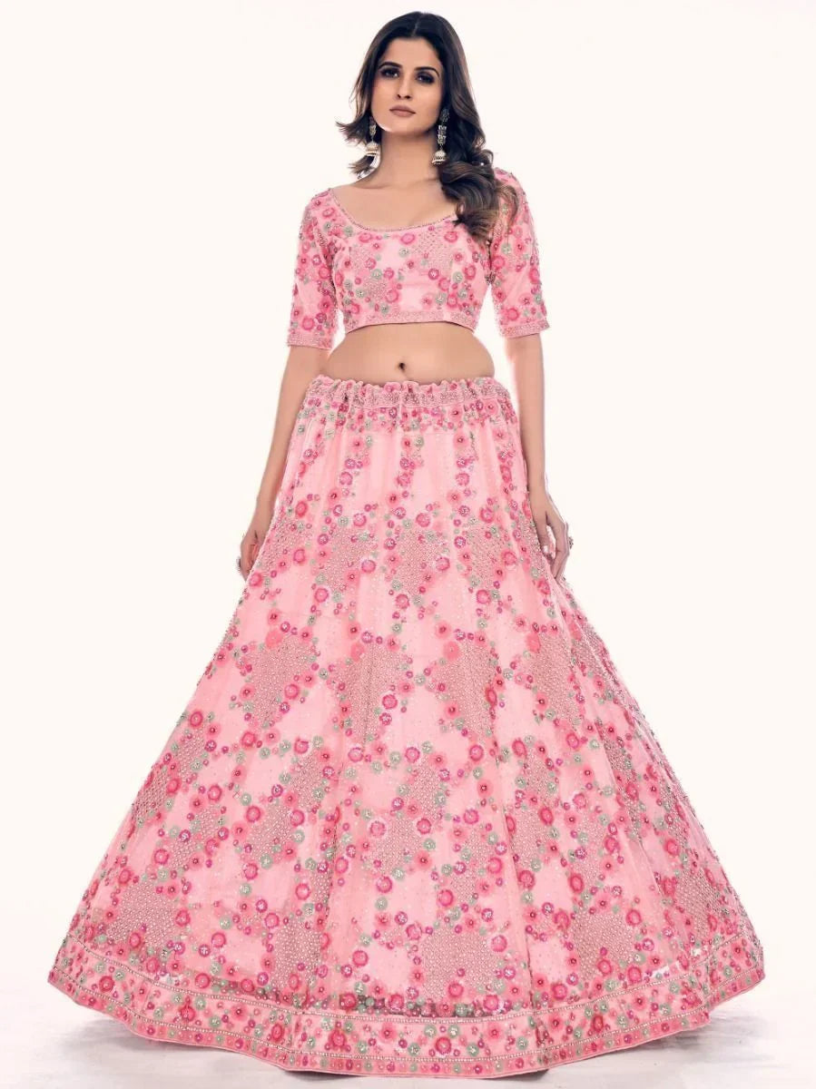 Impressive Pink Embroidered Soft Net Engagement Lehenga Choli