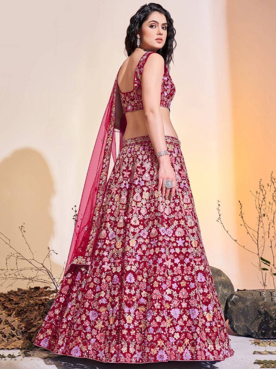 Maroon floral embroidered lehenga choli with sheer dupatta, perfect for Indian weddings and festive occasions