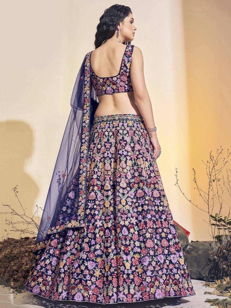 Floral print lehenga choli with backless blouse and sheer dupatta, ethnic Indian wear