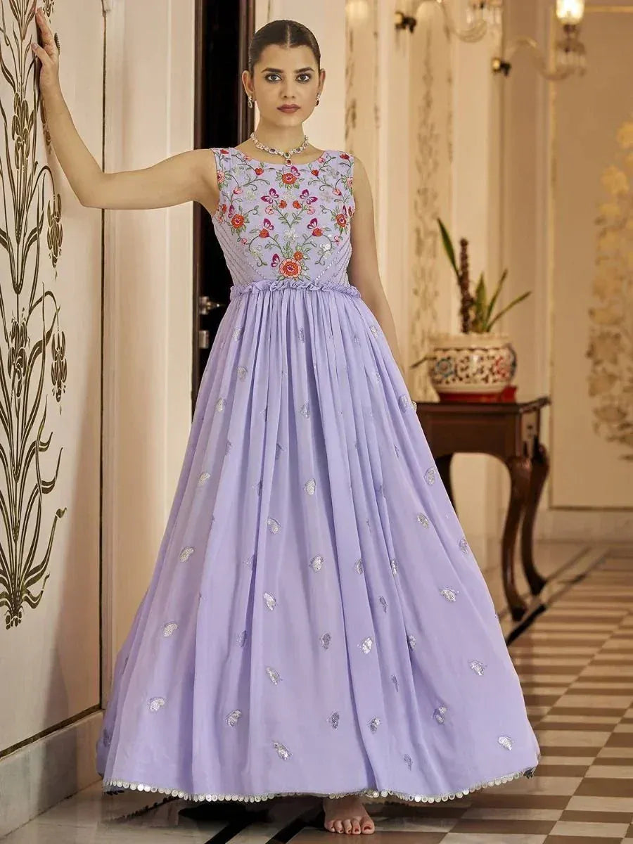 Lavender ethnic gown with floral embroidery and sequin detailing, perfect for Indian festive occasions
