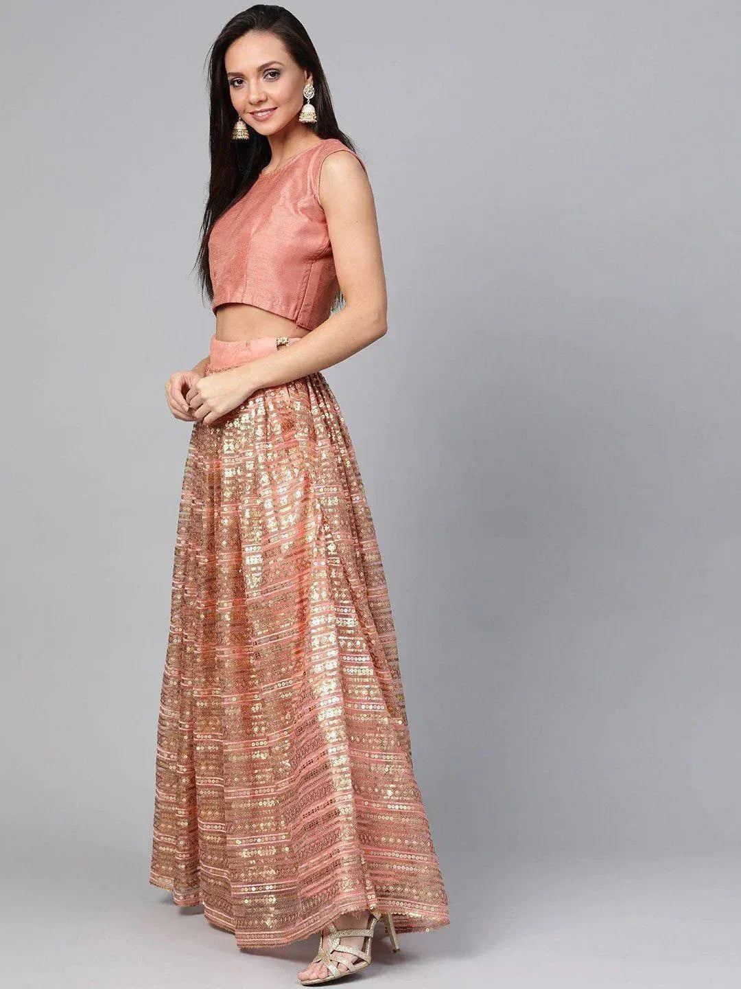 Pink sequin lehenga choli with sleeveless crop top, perfect for Indian ethnic wear events