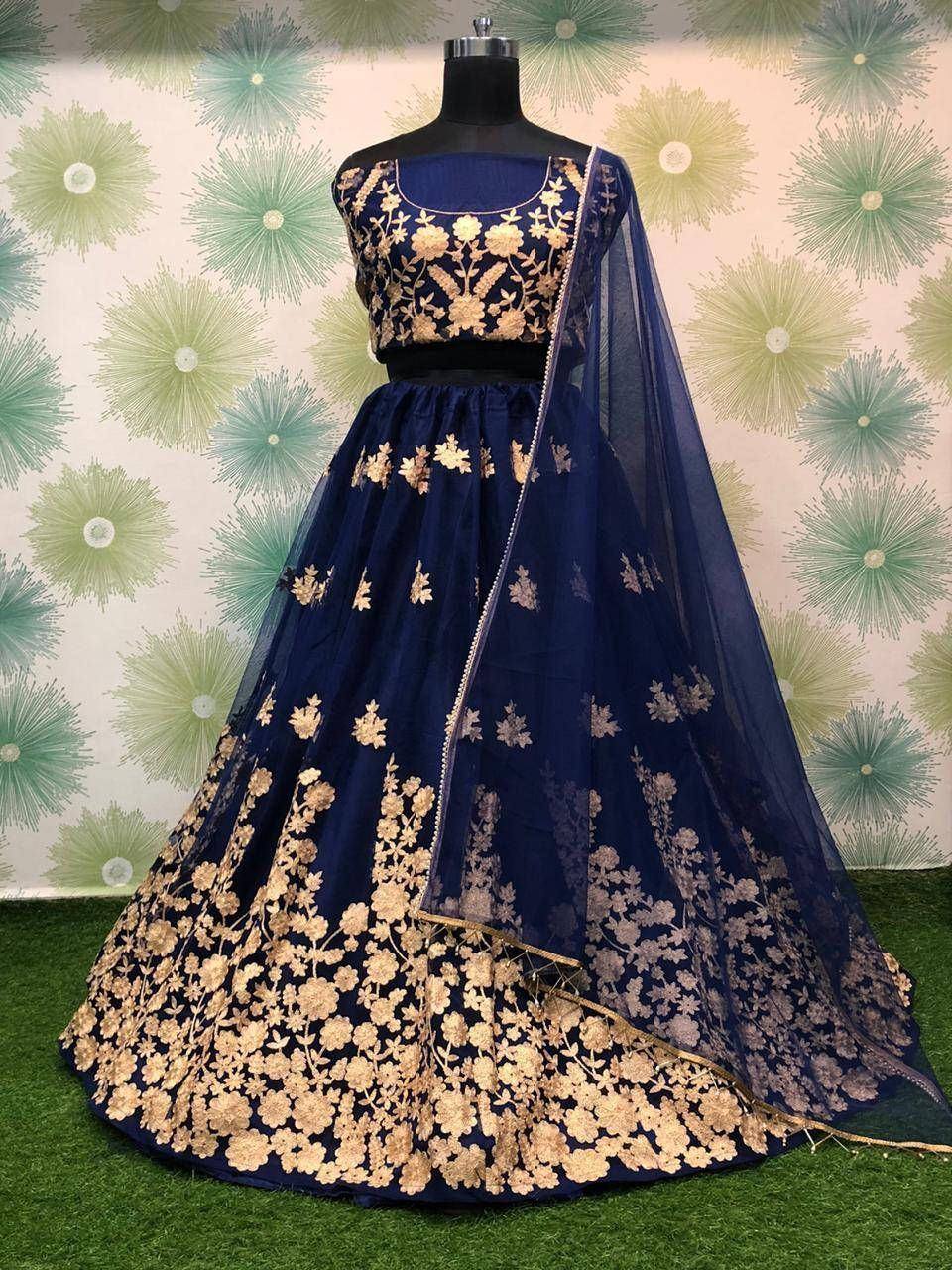 Navy blue lehenga choli with gold floral embroidery, perfect for Indian ethnic wear occasions