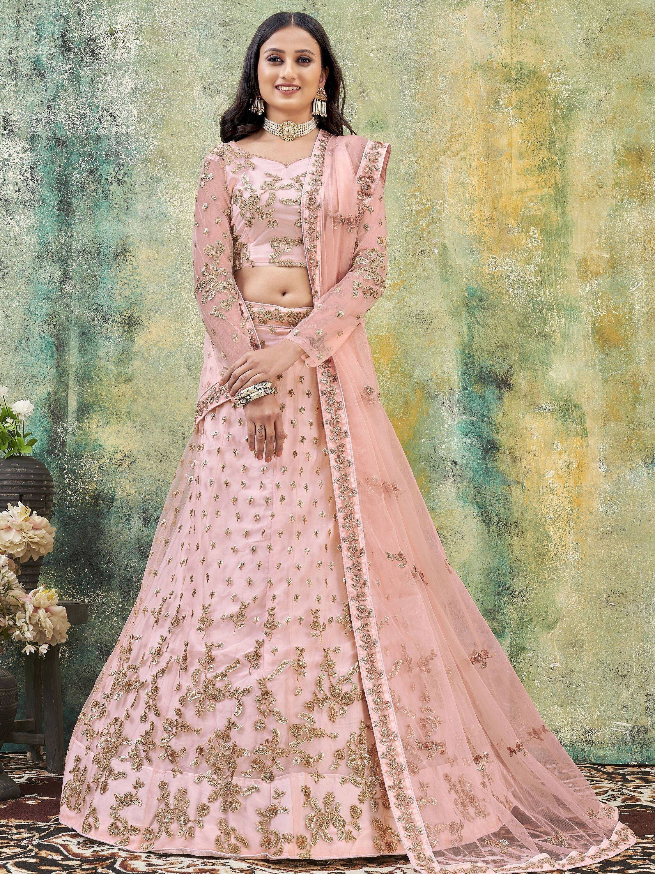 Pink embroidered lehenga choli with gold floral work, perfect for Indian weddings and festive occasions.