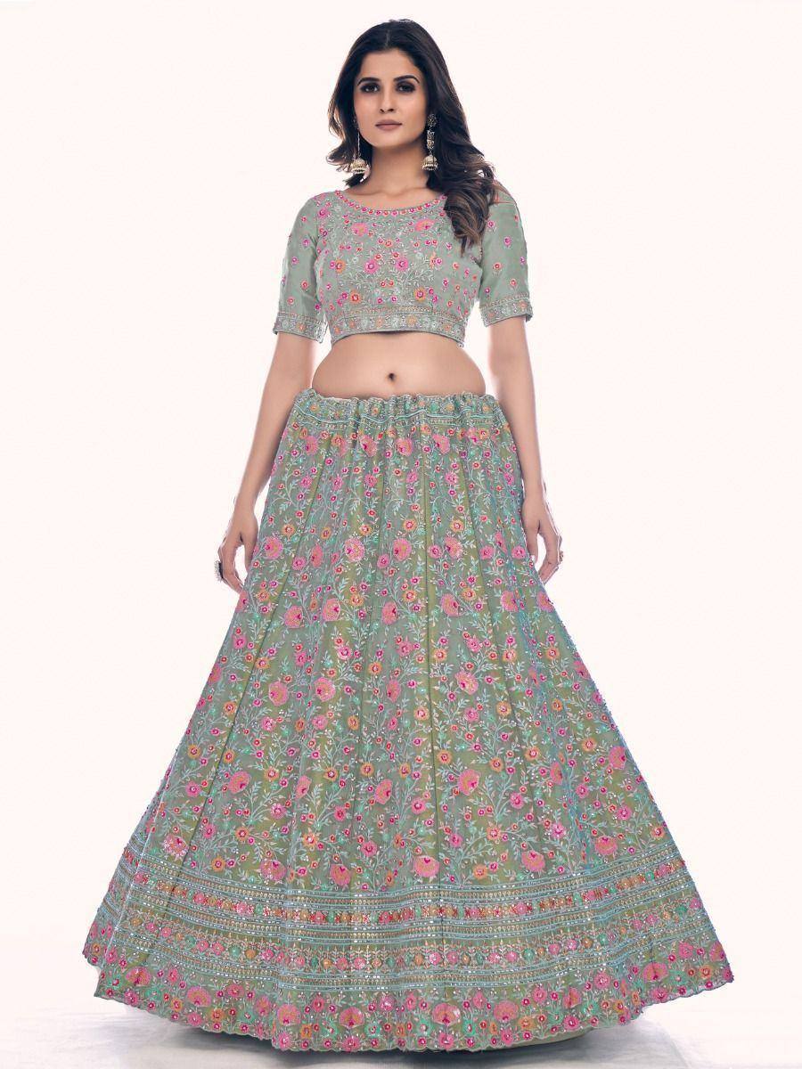 Mint green floral lehenga choli with pink embroidery, perfect for Indian ethnic wear occasions